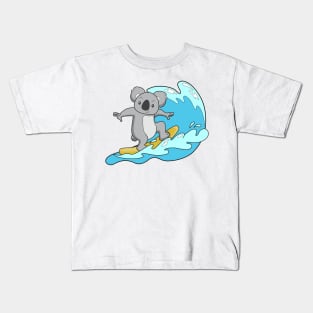 kawaii surfing koala Kids T-Shirt